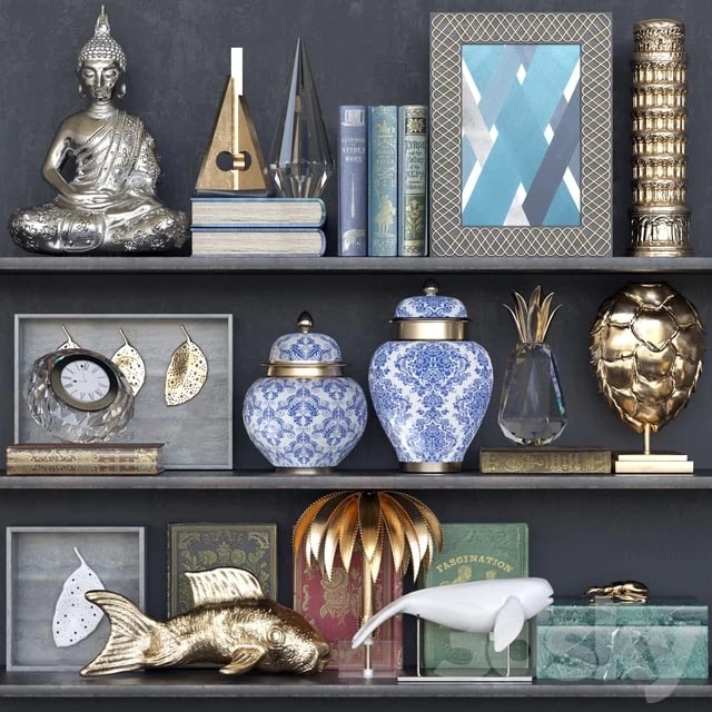 Shelf with a decorative set. Decor, vase, porcelain, book, jewelry box, gold, panel, clock, figurine