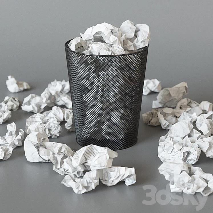 A trash can with papers