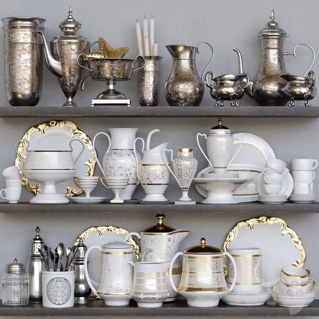 Classic crockery set. Tray, jug, duckling, plate, candles, cutlery, gold, cup